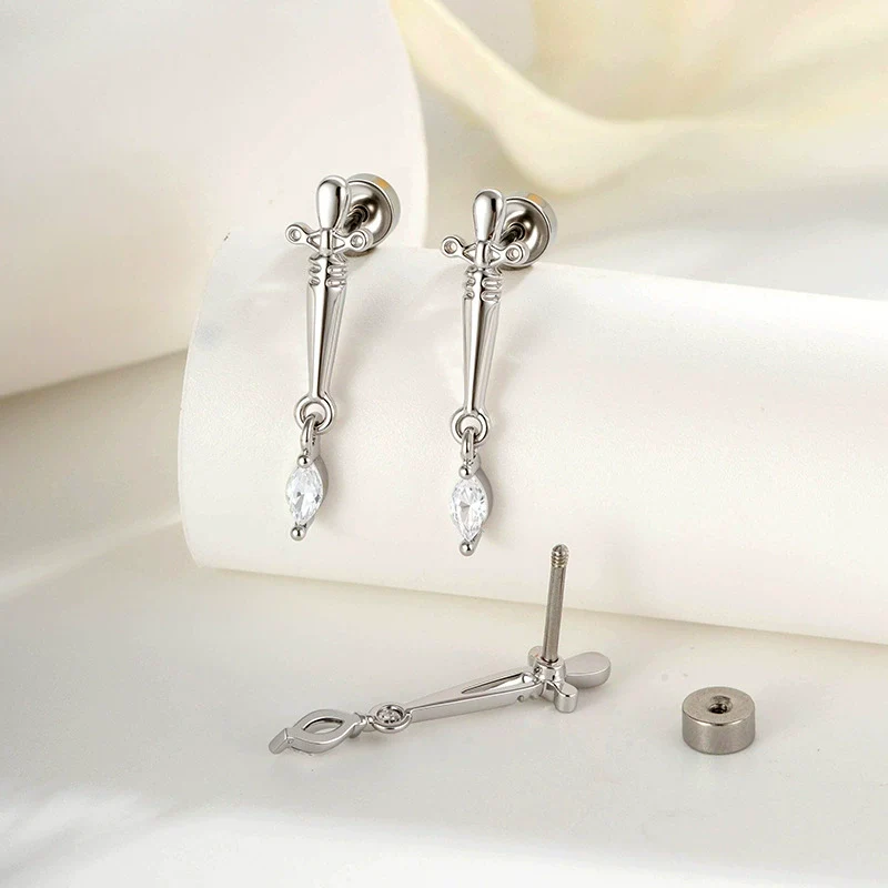 Metal Micropaved Zircon Dagger Cross Piercing Earrings For Couple - Image 2