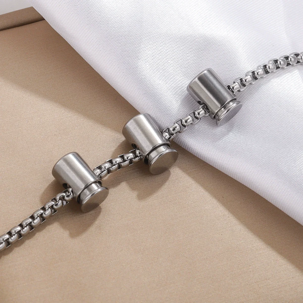 Stainless Steel Bell Elastic Spring Push Pull Adjustment Titanium Steel Buckle Accessories Handmade Chain Positioning Button With Hirback Pattern And Electroplating Treatment - Image 3