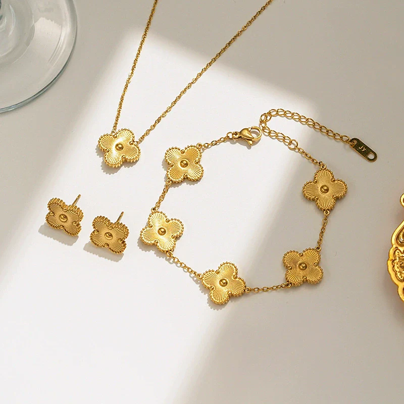 Titanium Steel Women's Fashion Versatile Laser Fourleaf Flower Set With Necklace Bracelet Earrings And Electroplating