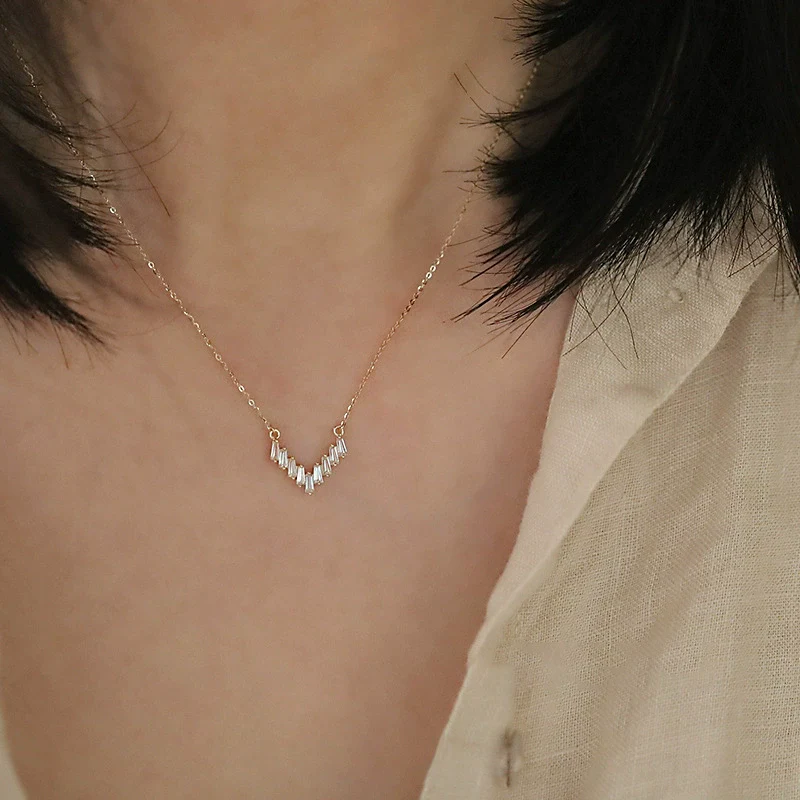 Wholesale 225 Silver Vshaped Women's Light Luxury Necklace With Small Skirt Pendant Inlaid With Square Zircon And Plated With 14K Gold And Chain With Letters Numbers Text Pattern - Image 3
