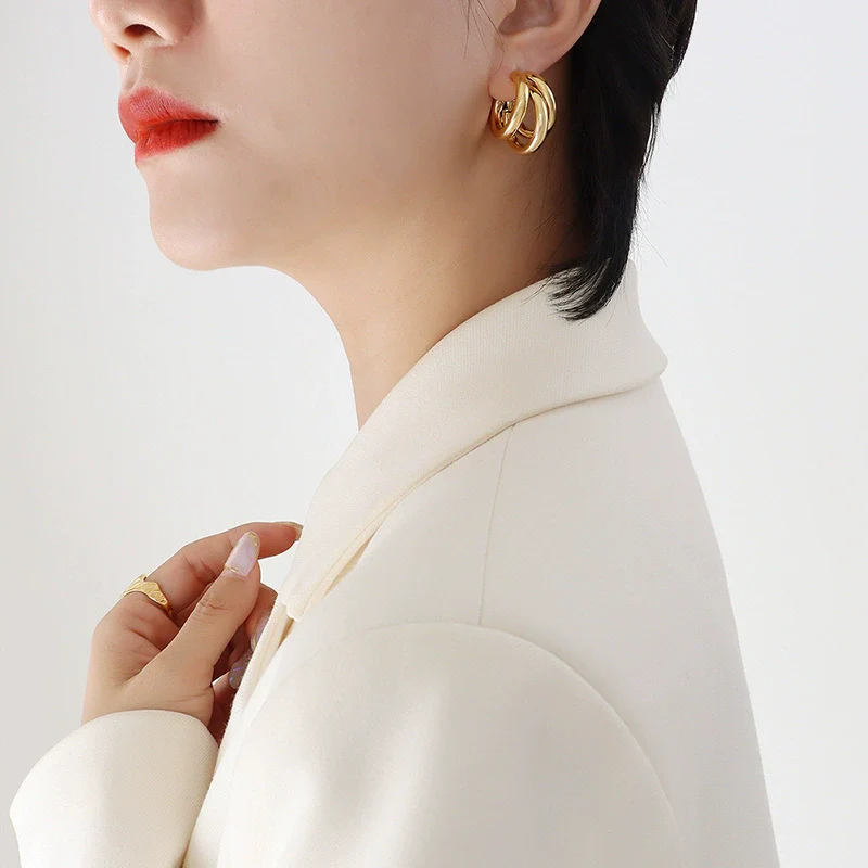 Wholesale Geometric Cshaped Hollow Round Tube Goldplated Titanium Steel Earrings With Niche Design