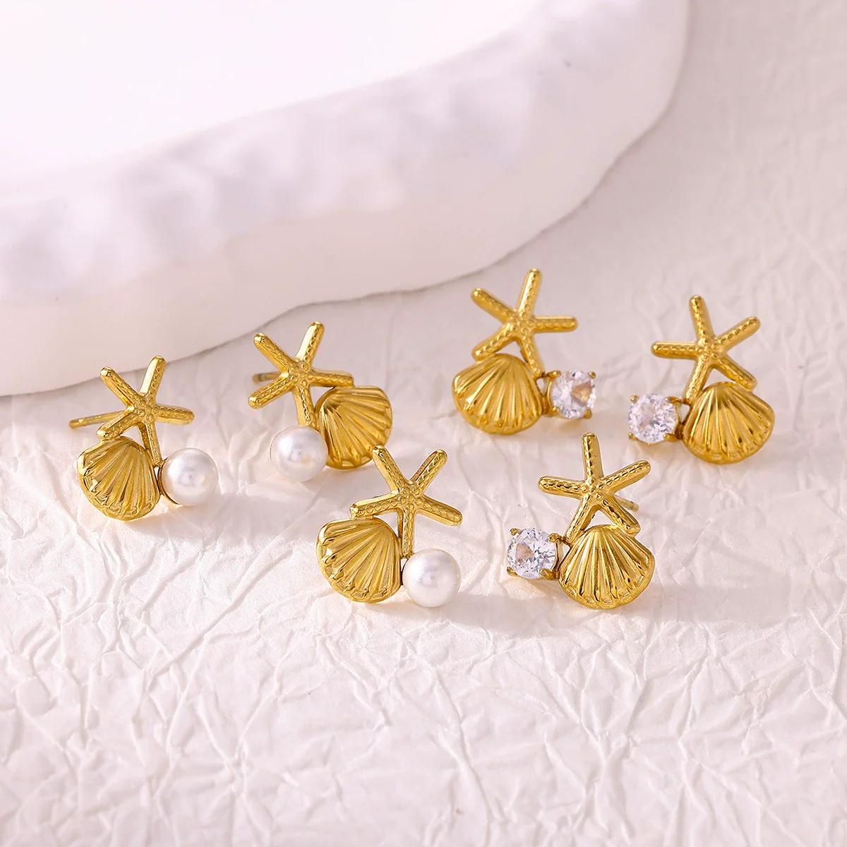 Wholesale Geometric Stainless Steel And Gold Electroplated Unisex Starfish Shell Earrings With Imitation Pearl And Zircon