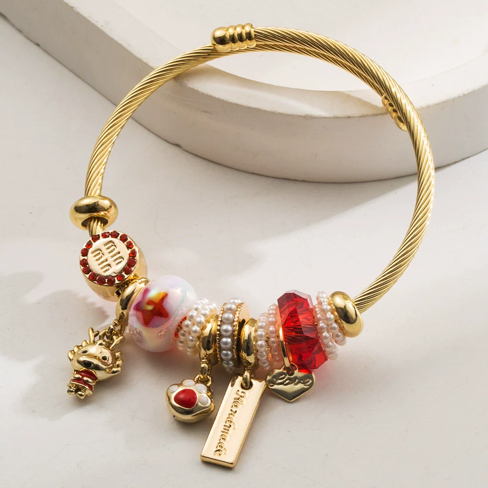Wholesale Golden Stainless Steel Alloy Women's Bracelet With Diamond Treatment And Small Animal Pendant - Image 8