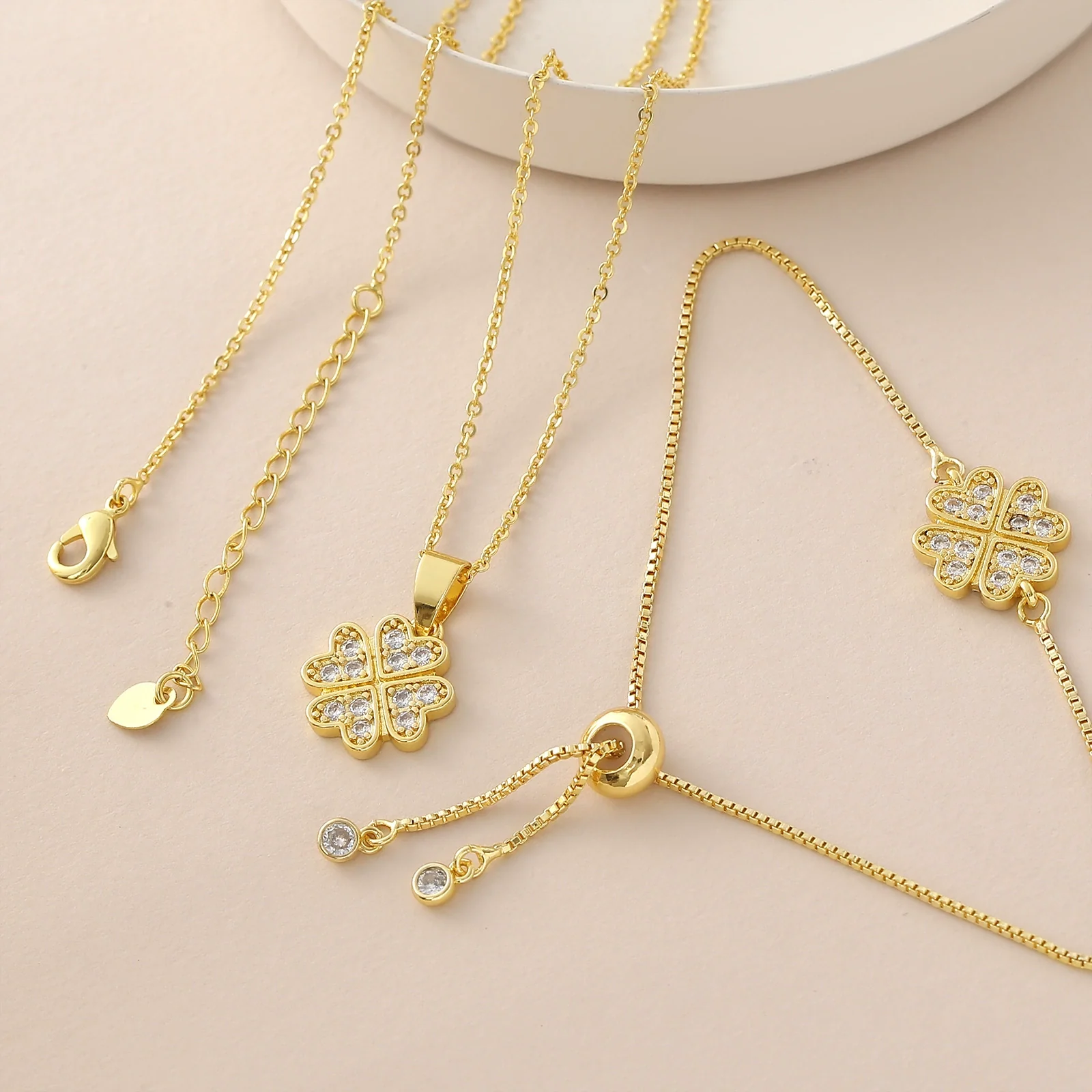 Wholesale Ins Style Goldplated Copper Fourleaf Clover Pendant Necklace With Pullout Bracelet Jewelry Set For Women - Image 3