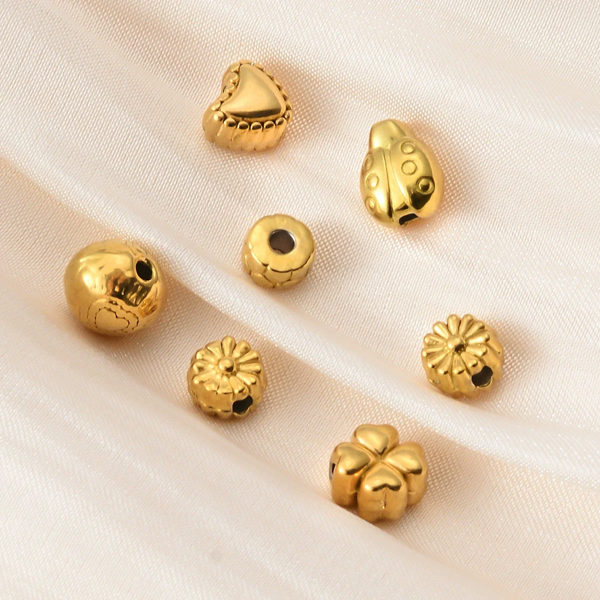 Wholesale Jewelry Titanium Steel Loose Beads Spacer Beads Love Embossed Perforated Fashion Style Drum Beads With Gold Plating - Image 4