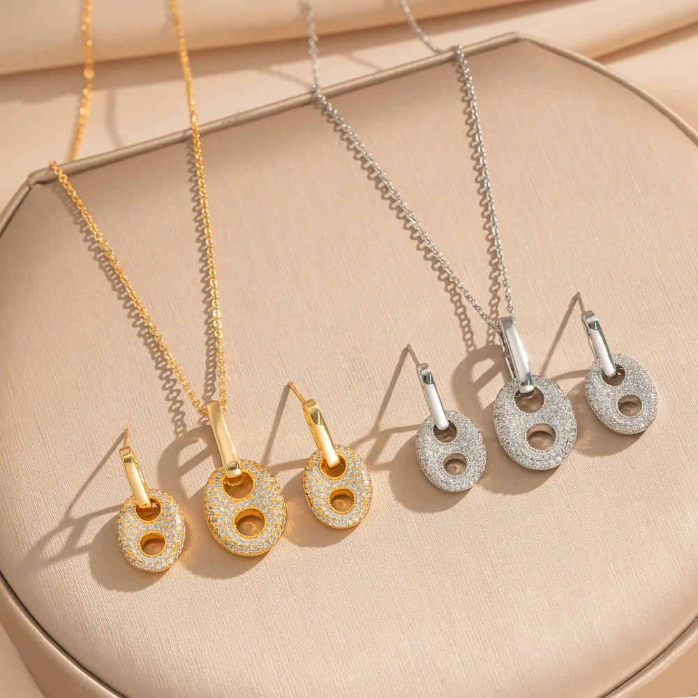 Wholesale Light Luxury Geometric Pig Nose Earrings And Necklaces Set Real Gold Electroplated With Diamonds Inlaid Titanium Steel And Environmentally Friendly Copper For Women
