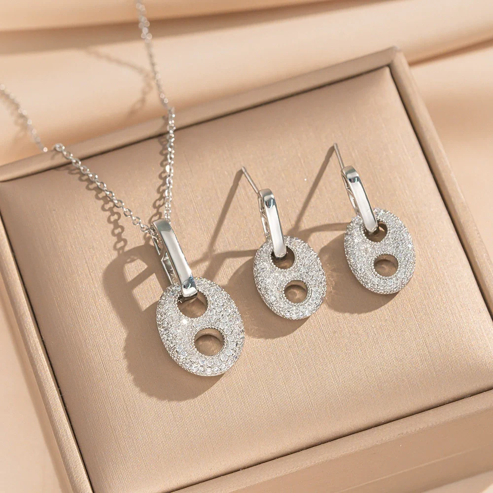 Wholesale Light Luxury Geometric Pig Nose Earrings And Necklaces Set Real Gold Electroplated With Diamonds Inlaid Titanium Steel And Environmentally Friendly Copper For Women - Image 11