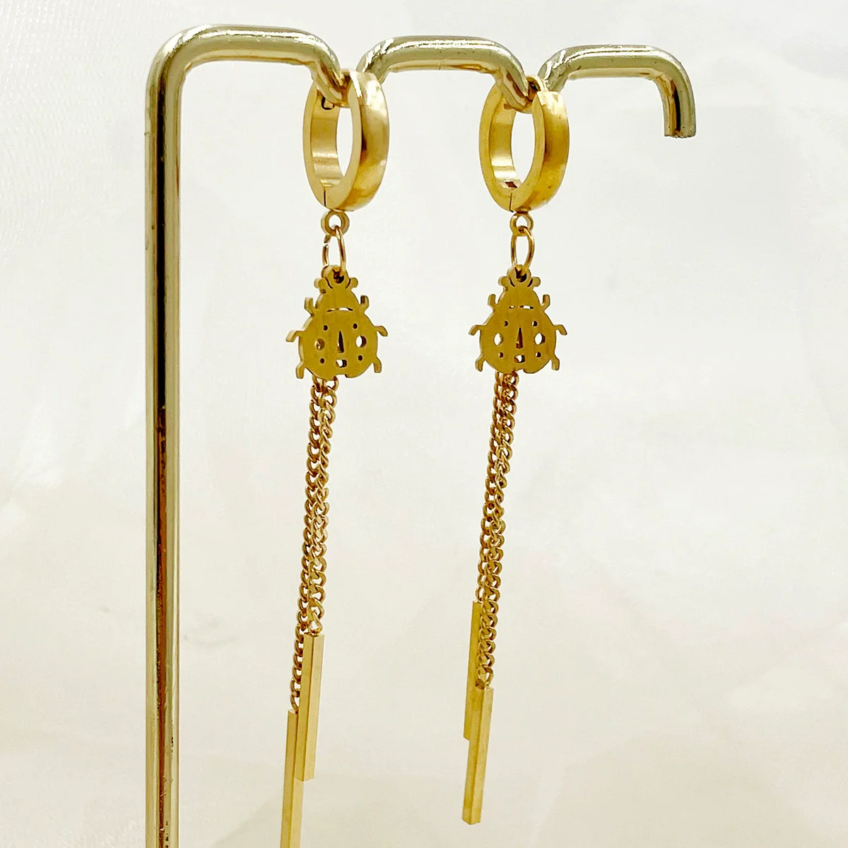 Wholesale Stainless Steel Chain Tassel Earrings Electroplated With Sun Moon Stars Flowers Animal Shapes - Image 22