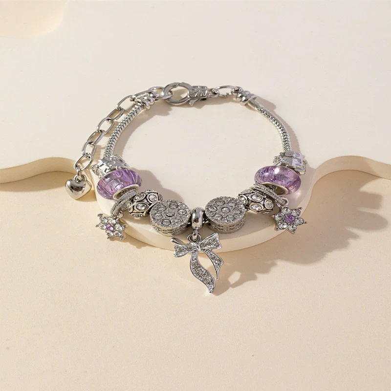 Wholesale Unisex Fashion Copper Alloy Bracelet With Electroplated Flower Bow Geometric Pendant - Image 3