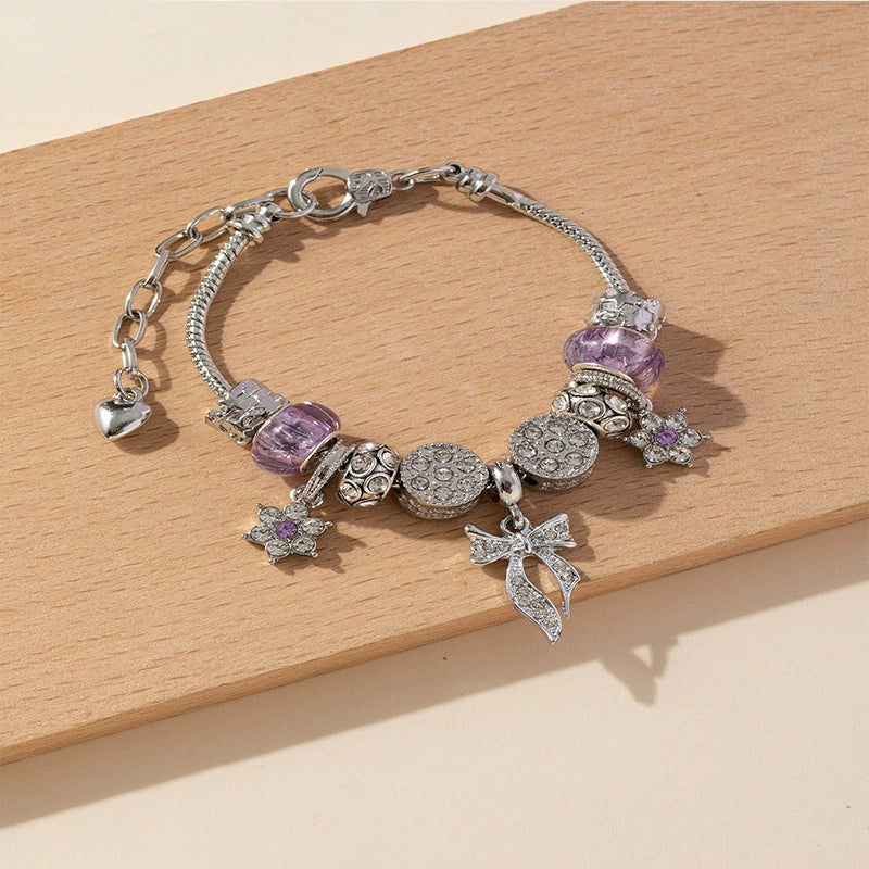 Wholesale Unisex Fashion Copper Alloy Bracelet With Electroplated Flower Bow Geometric Pendant - Image 4