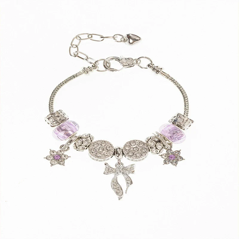 Wholesale Unisex Fashion Copper Alloy Bracelet With Electroplated Flower Bow Geometric Pendant - Image 5