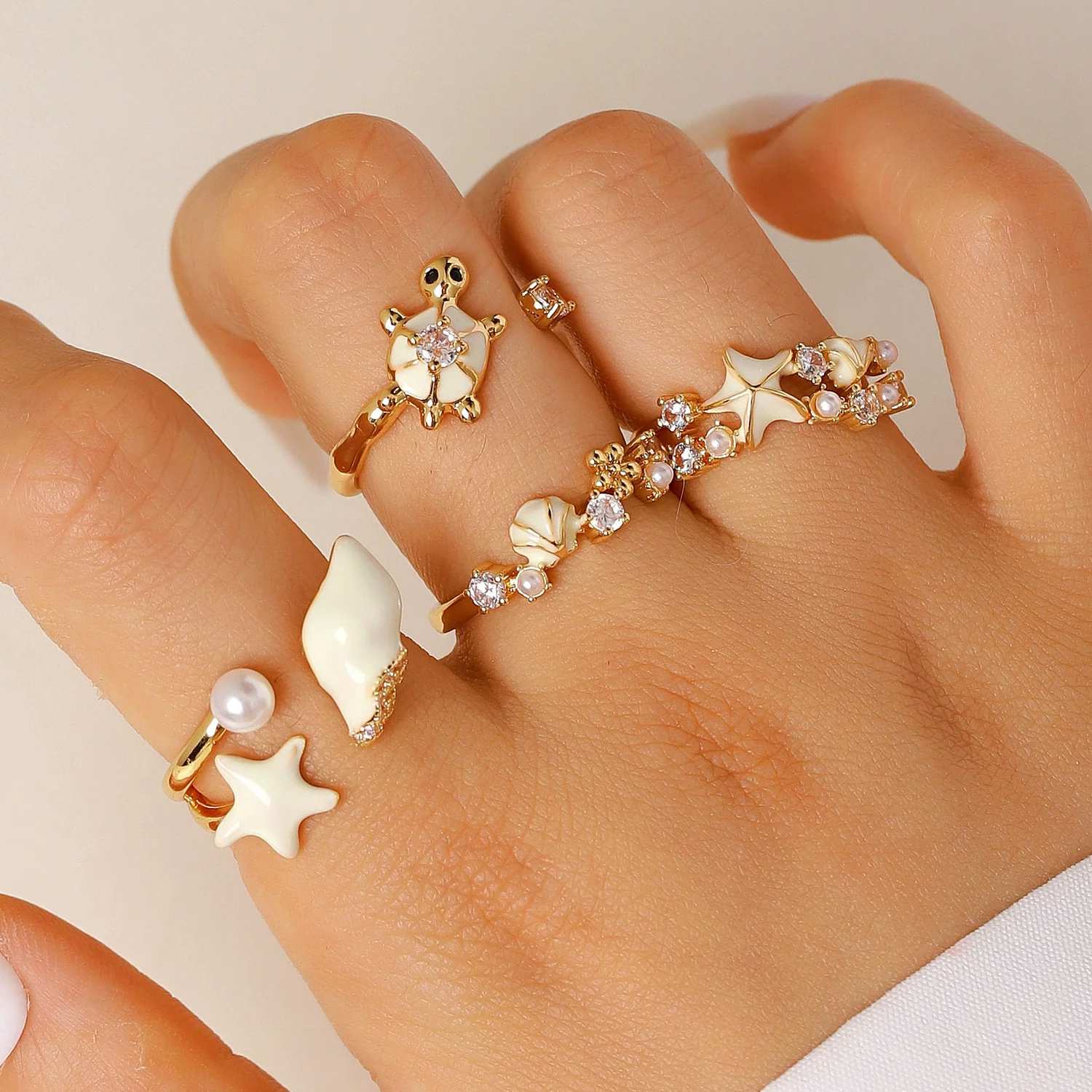 Wholesale Women's Adjustable Enamel Pearl Zircon Ring Set With Turtle Starfish And Shell Design Featuring Drip Glaze Process