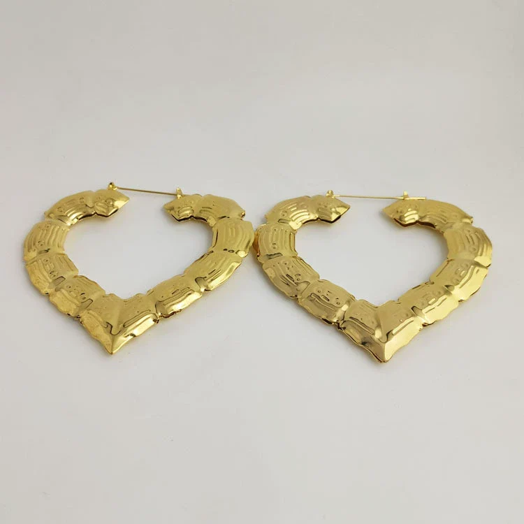 Wholesale Women's Alloy Geometric Exaggerated Golden Circle Hip Hop Street Dance Electroplated Earrings - Image 2