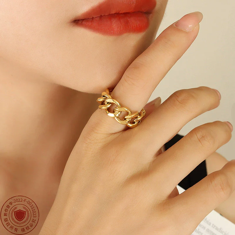 Wholesale Women's Geometric Hollow Twist Opening Electroplated Titanium Steel Ring - Image 2