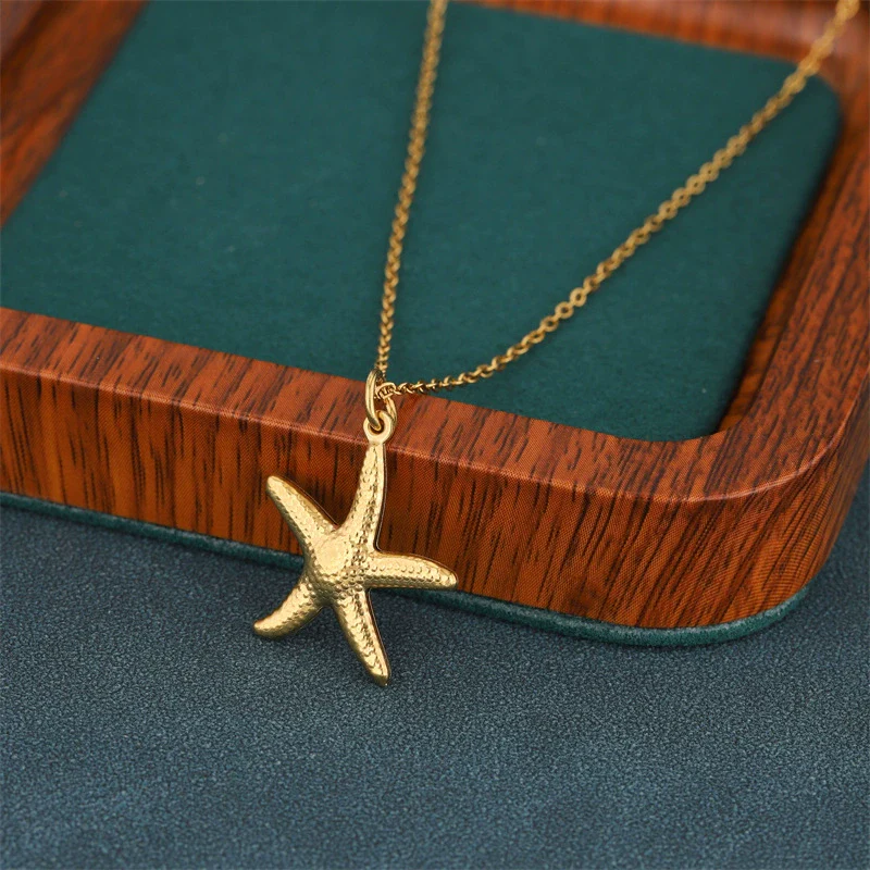 Wholesale Women's Geometric Minimalist Fivepointed Starfish Pendant Necklace Stainless Steel With 18K Gold Electroplating Cross Chain - Image 2