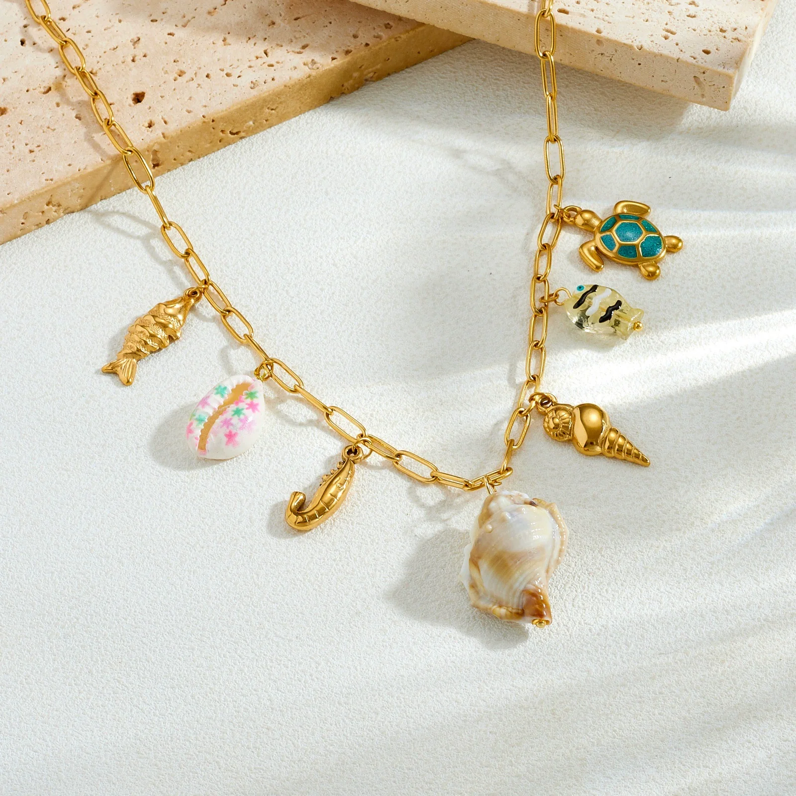 Wholesale Women's Goldplated Stainless Steel Marine Life Conch And Small Fish Pendant Necklace With Flat Cross Chain - Image 3