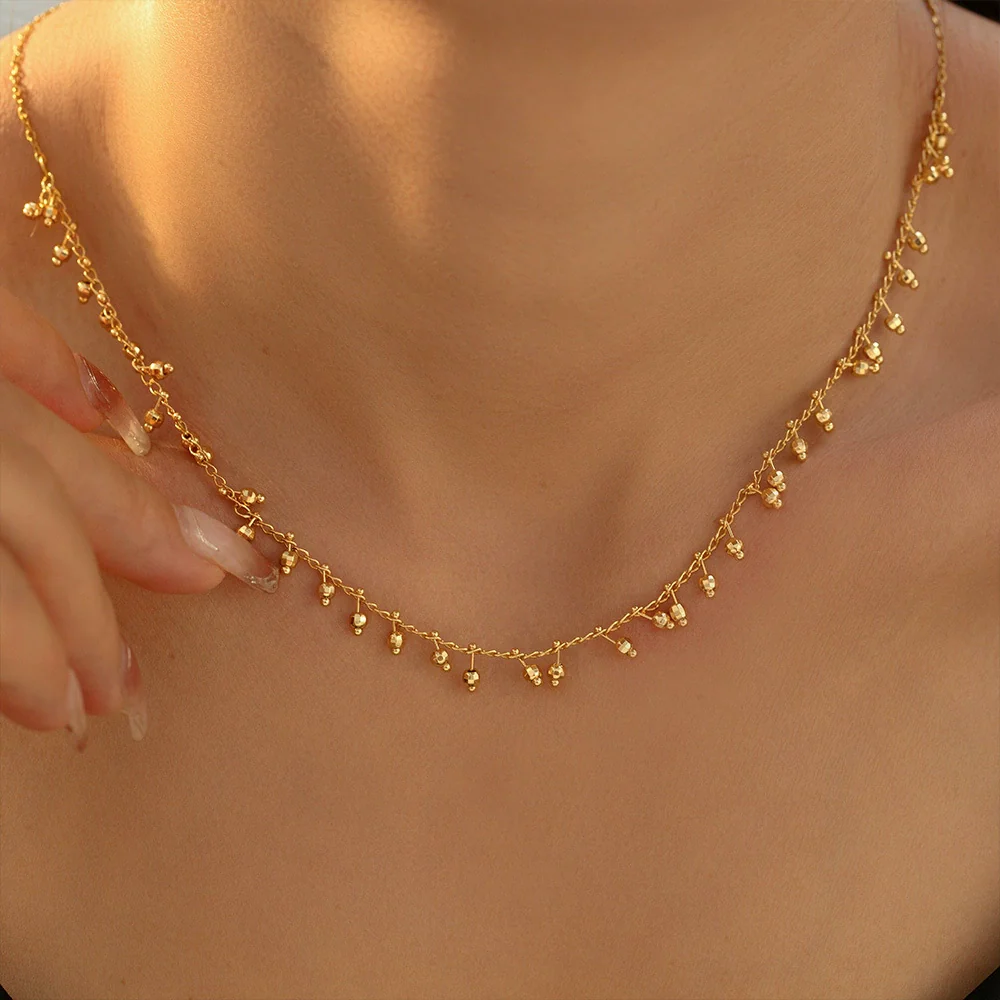 Wholesale Women's Light Luxury Geometric Copper And Titanium Steel Plated 18K Gold Round Ball Stitching Gourd Tassel Pendant Necklace - Image 3