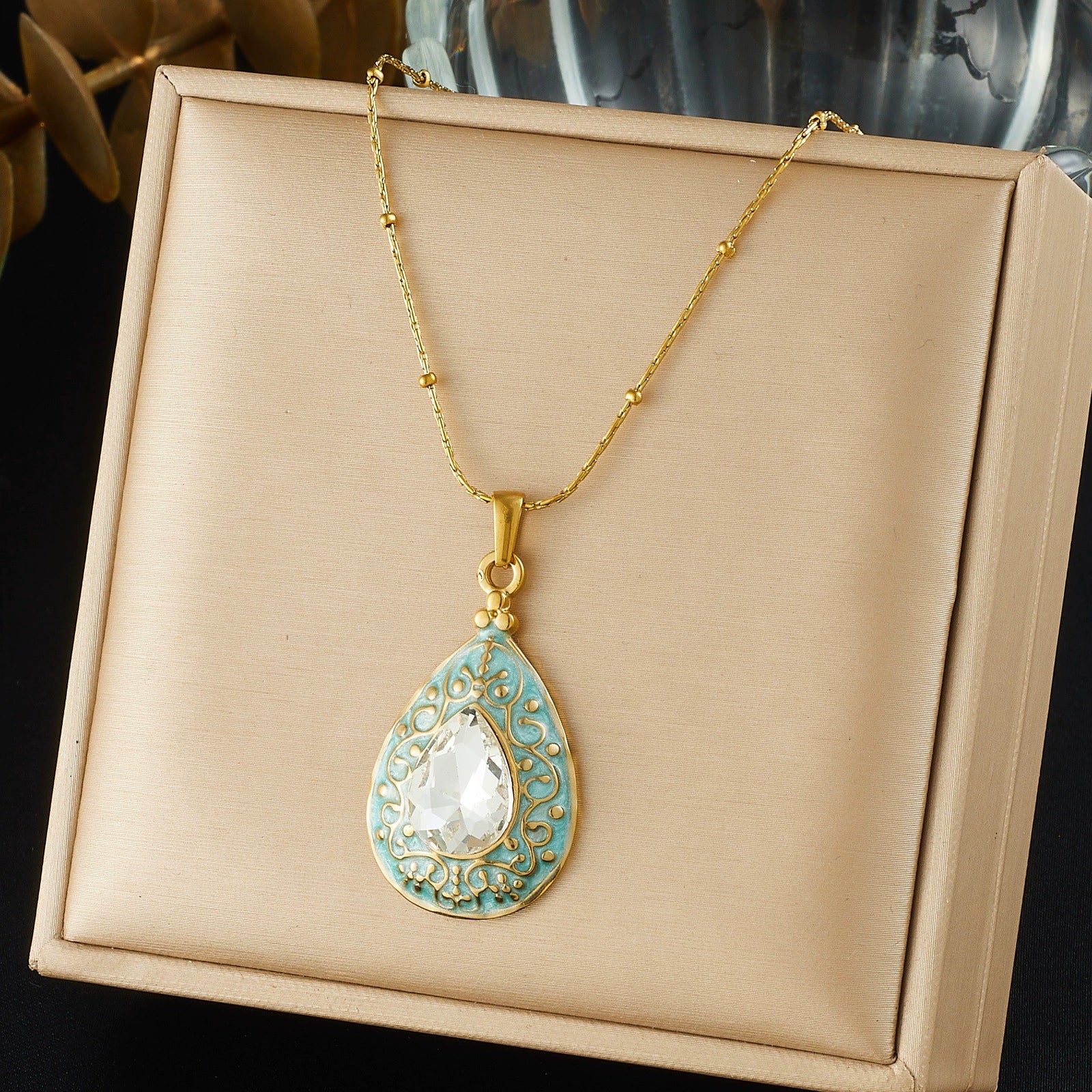 Wholesale Women's Light Luxury Goldplated Stainless Steel Drop Shape Carved Water Drop Necklace With Diamond Inlay And Bamboo Chain