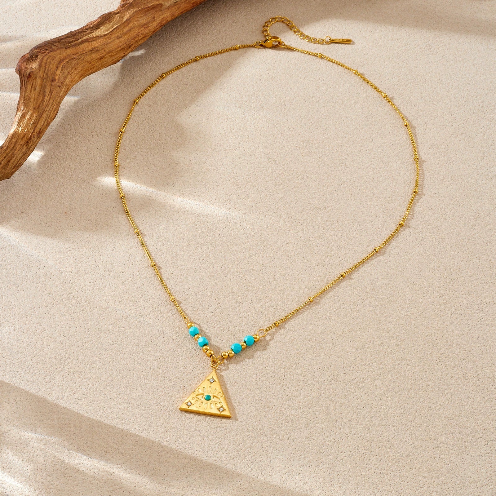 Wholesale Women's Medieval Geometric Blue Turquoise Rhinestone Eye Pattern Triangular Pendant Stainless Steel Electroplated Necklace - Image 2