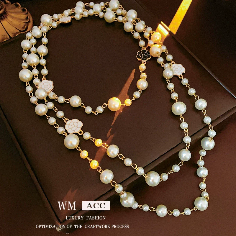 Wholesale Women's Metal And Imitation Pearl Sweater Chain Necklace With Flower Pattern And Light Luxury Style Set With Pearls - Image 12