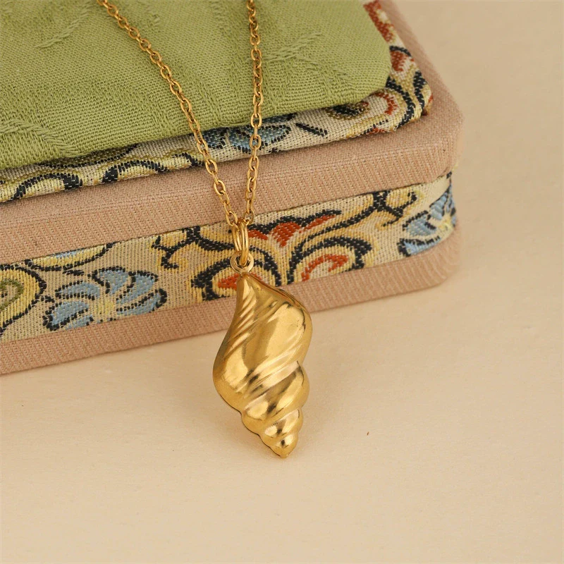Wholesale Women's Minimalist Geometric Stainless Steel 18K Gold Electroplated Conch Hollow Twist Necklace With Cross Chain