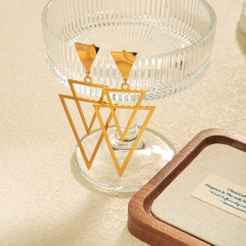 Wholesale Women's Stainless Steel Light Luxury Niche Design Overlapping Hollow Triangle Earrings With Leaves Pattern And Electroplating Treatment - Image 3