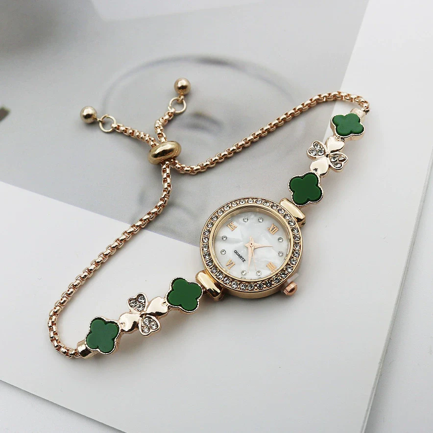 Women's Alloy And Stainless Steel Four Leaf Clover Fashion Pull Bracelet Watch With Round Dial