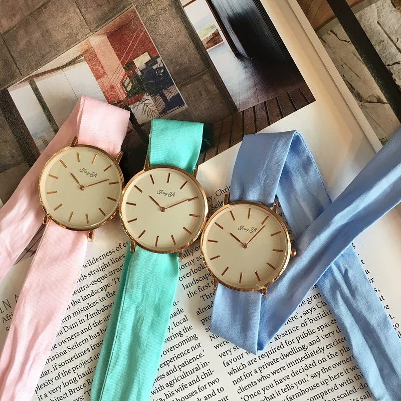 Women's Alloy Case Cloth Belt Round Dial Printed Logo Canvas Strap Leisure Watch - Image 2
