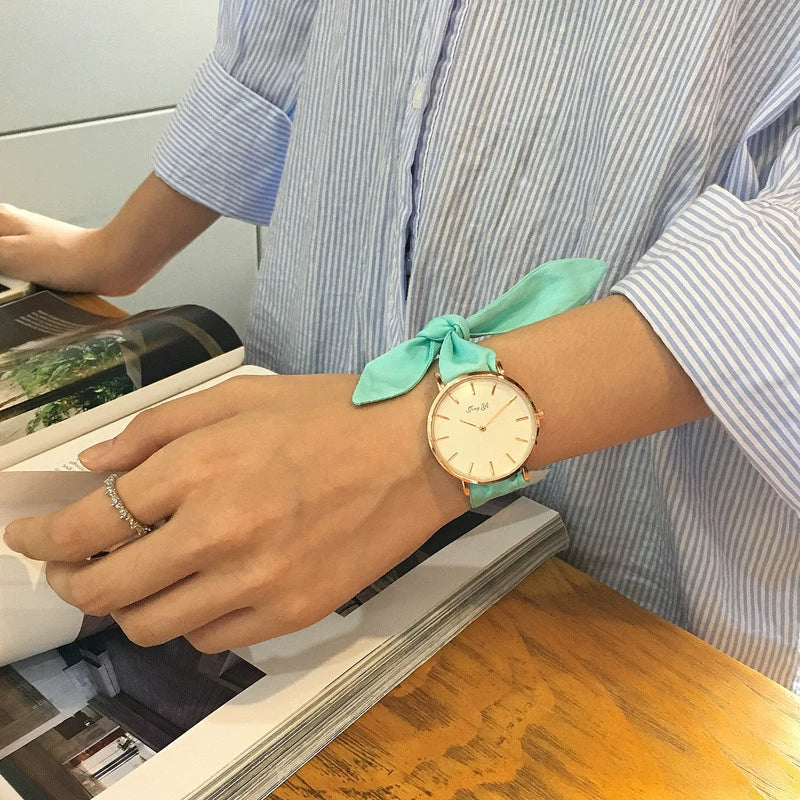 Women's Alloy Case Cloth Belt Round Dial Printed Logo Canvas Strap Leisure Watch - Image 3