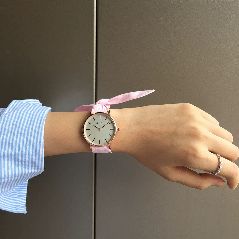 Women's Alloy Case Cloth Belt Round Dial Printed Logo Canvas Strap Leisure Watch - Image 4