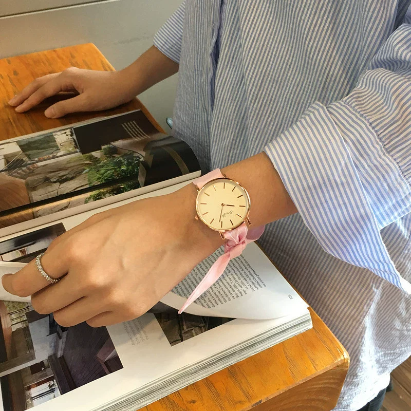 Women's Alloy Case Cloth Belt Round Dial Printed Logo Canvas Strap Leisure Watch - Image 5