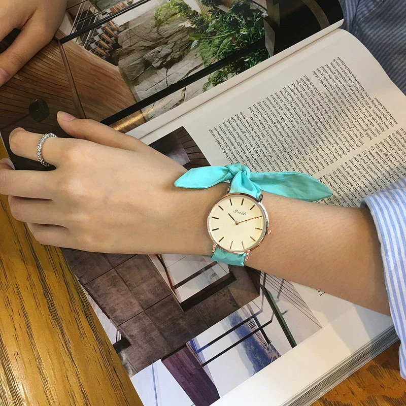 Women's Alloy Case Cloth Belt Round Dial Printed Logo Canvas Strap Leisure Watch - Image 6