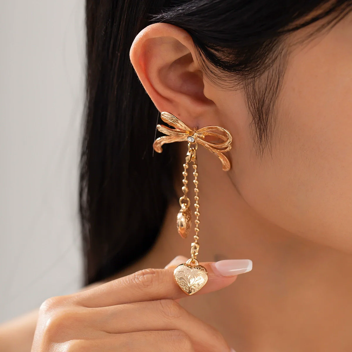 Women's Alloy Heartshaped And Bow Pattern Electroplated Metal Chain Pendant Earrings - Image 2