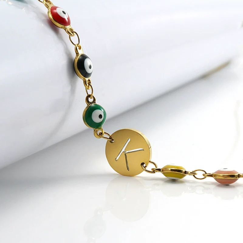 Women's Stainless Steel And 18K Gold Plated Letter Evil Eye Dripping Oil Bracelet - Image 4