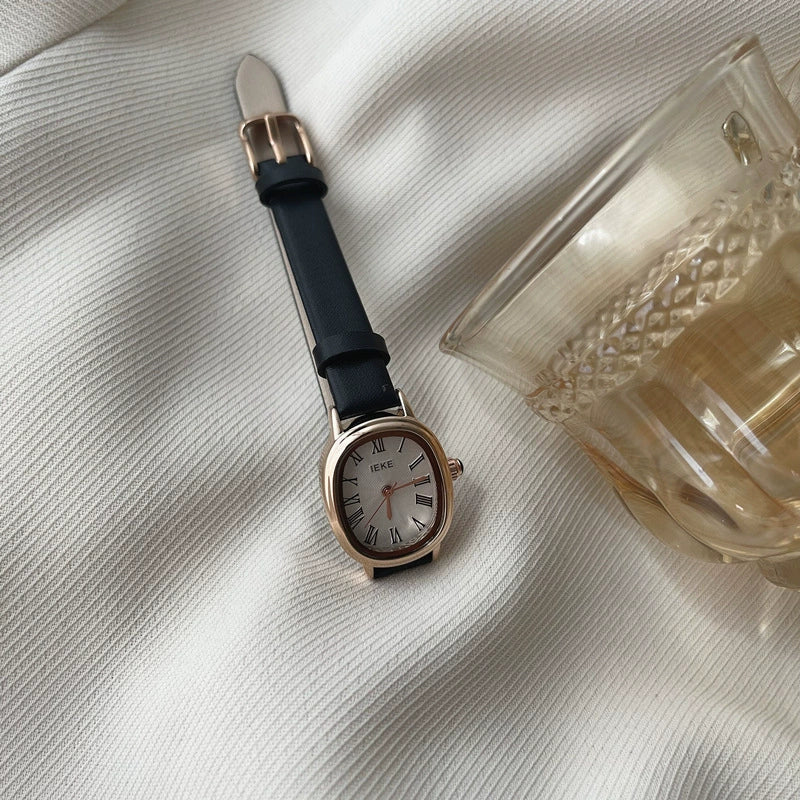 Women's Summer French Retro Alloy Case Ordinary Glass Mirror Oval Thin Band Compact Roman Golden Watch - Image 3